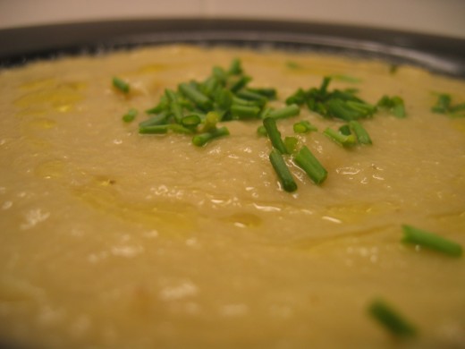 With snipped chives